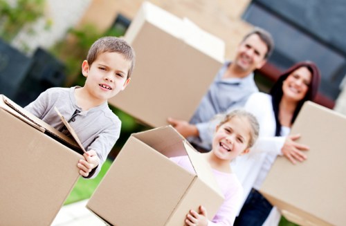 Packed boxes and furniture ready for transport in Freezywater