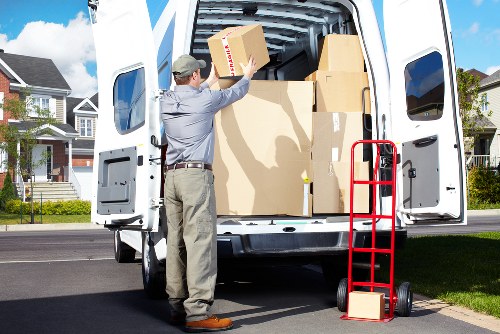 Local movers handling furniture in a Freezywater home move