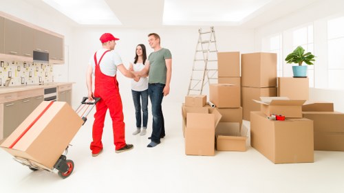 Professional movers preparing boxes for a local Freezywater move