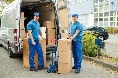 Team loading furniture for a local move in Freezywater