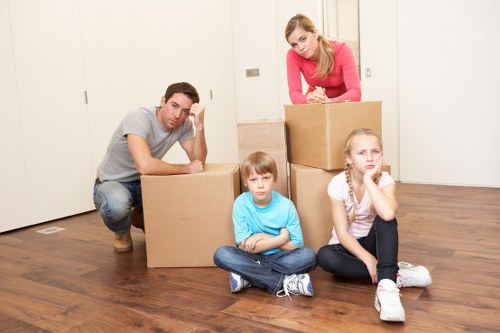 Local moving team handling boxes and furniture during a Freezywater relocation
