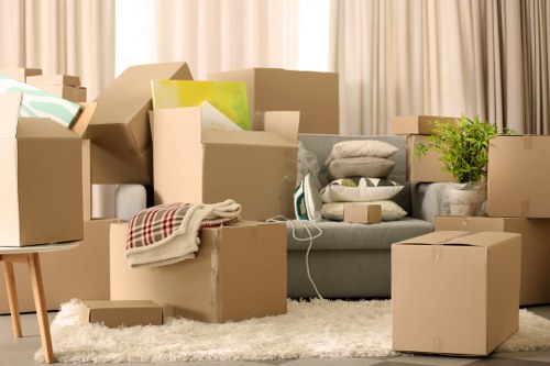 Office furniture and equipment being prepared for a commercial move