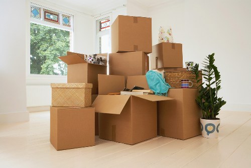 Packed boxes and furniture ready for transport during a local move