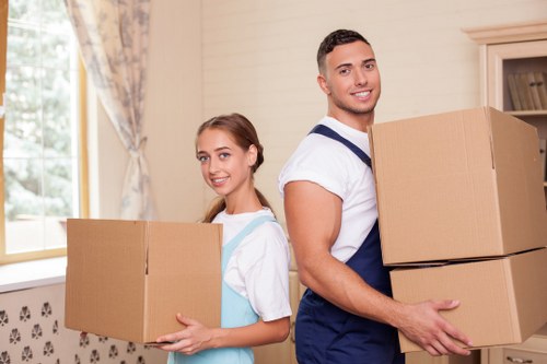 Careful loading of household items by a removal team